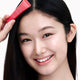 Enlarge image of Lip Glowy Balm Berry (Pink tint) on Model