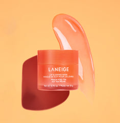 A container of Laneige Lip Sleeping Mask with a dollop of mask spread out behind it
